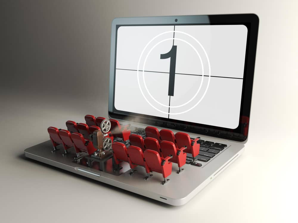 Video Player Application or Home Cinema Concept. Laptop and Rows of Cinema Seats, 3d Illustration