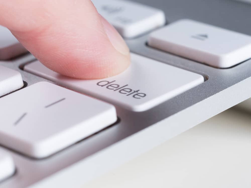 Finger Pressing Delete Key of Computer Keyboard